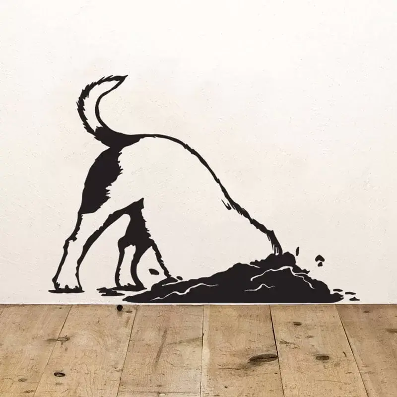 Sød hund der graver hul wallsticker til væggen
